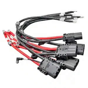 Industrial forklift charging harness with high-current acid-resistant wiring, heavy-duty battery connectors, and full-coverage protective insulation.