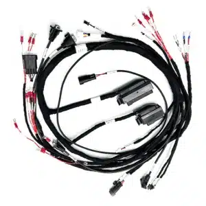 Servo harness with high-flex specialized conductors, full-coverage protective sleeving, and ruggedized circular connectors.