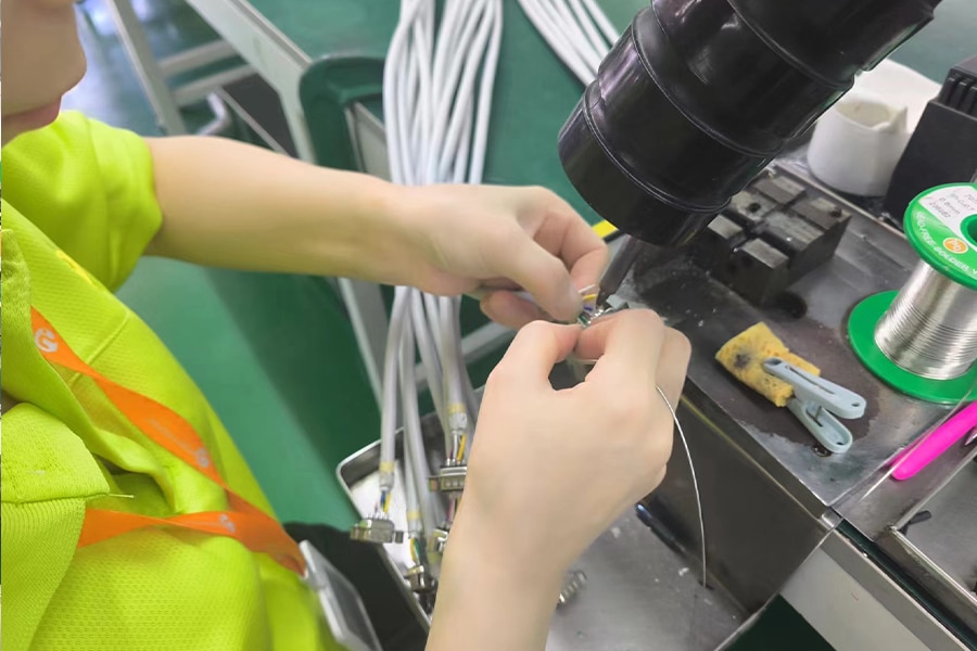 Manual soldering of wire harness terminals