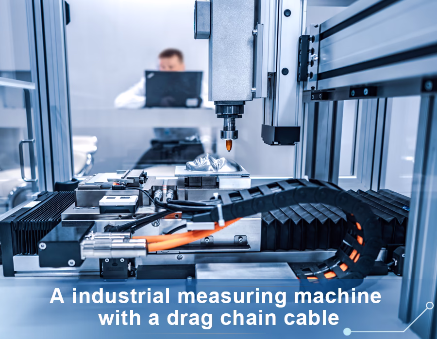 An industrial dosing machine equipped with a drag-chain cable. The wires inside the chain require oil- and abrasion-resistant jackets. A PUR jacket (as pictured) protects wiring from industrial fluids and debris.