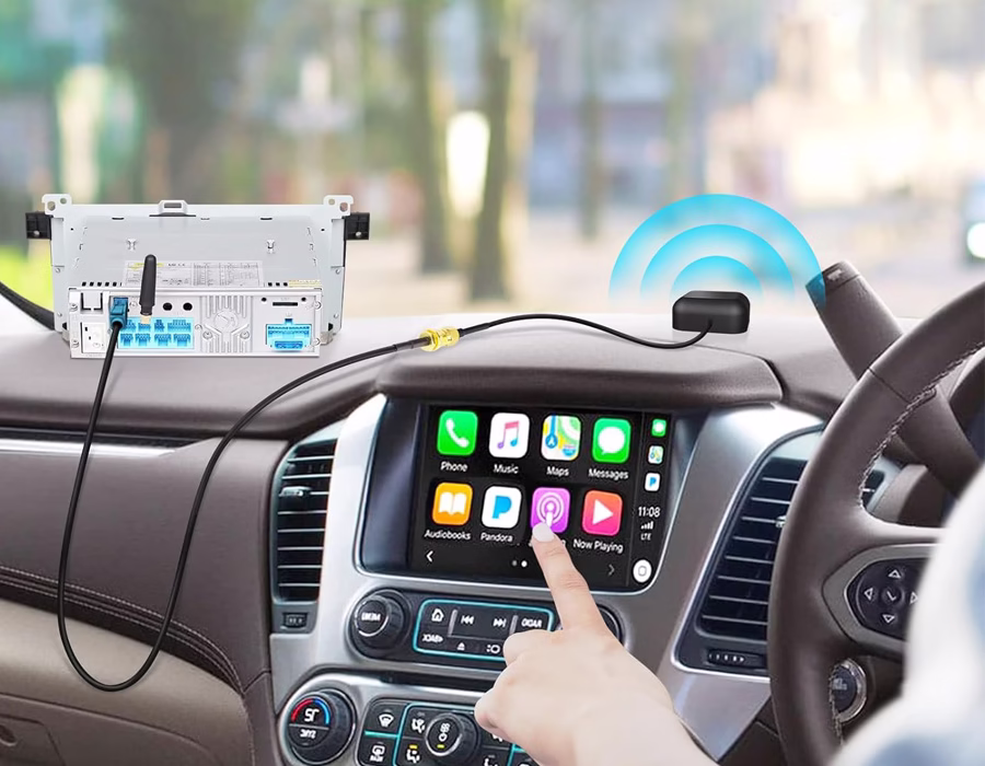 FAKRA Z-type connector locked into place on an automotive dashboard port.