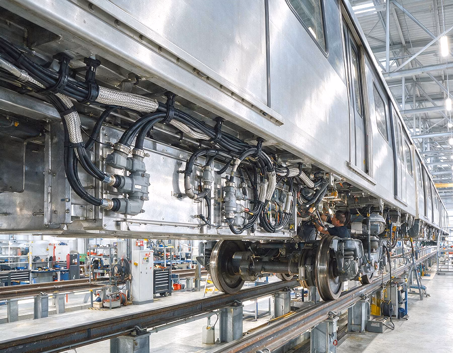 Custom cable assemblies integrated into a modern railway train electrical system.