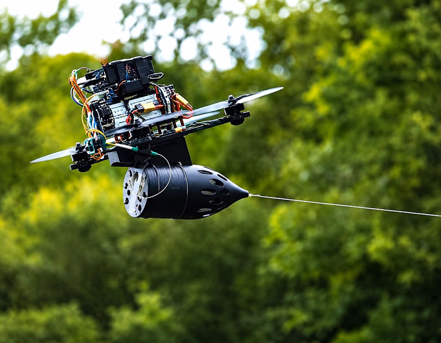 Drone fiber optic cable unspooling in flight