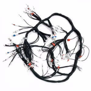 A complex custom industrial wiring harness branching into numerous individual black wires with red, white, and blue labeled sleeves and male pin terminals on a white background.